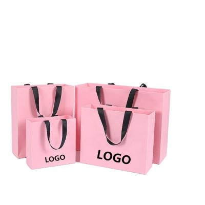 China Recycled Materials Hot Sale Paper Bags Craft Paper Gift Bag Custom Paper Shopping Bag With Logo Print for sale