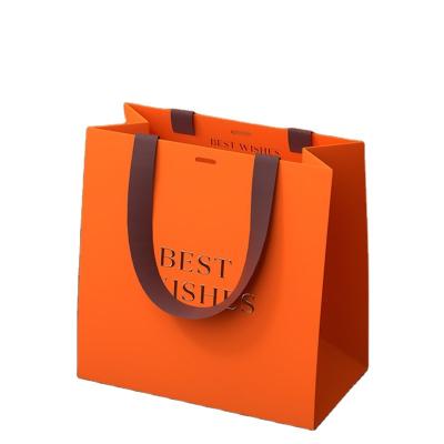 China Recycled Materials Customize Design Waterproof Fancy Kraft Paper Shopping Bag Printing Gift OEM Custom Craft Outer Packaging For Clothes Shoes for sale