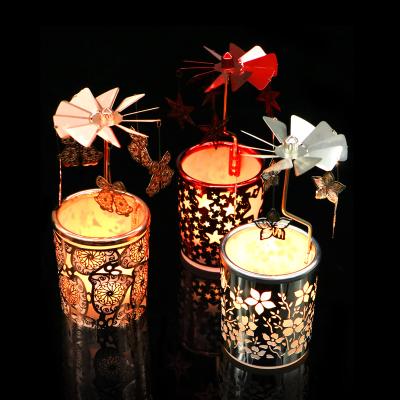 China Rotary Rotating Candle Holder Christmas Theme Carousel Candlesticks Butterfly Flowers Baby Shower Gift for Home Decor for sale