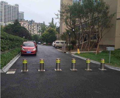 China Los bolardos de levantamiento hidráulicos/espray de la seguridad en carretera cubrieron los bolardos retractables eléctricos en venta