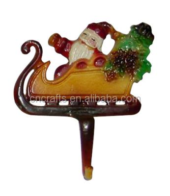 China Antique Santa in Toys Cast Iron CHRISTMAS STOCKING HOLDER SOLID HOLDER Sleigh Bag for sale