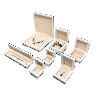 China Unique Custom Design Hot Selling SUNDO Wedding Gifts Jewelry Packaging Ring Necklace Bracelet Ring High Glossy White Wooden Jewelry Box for sale