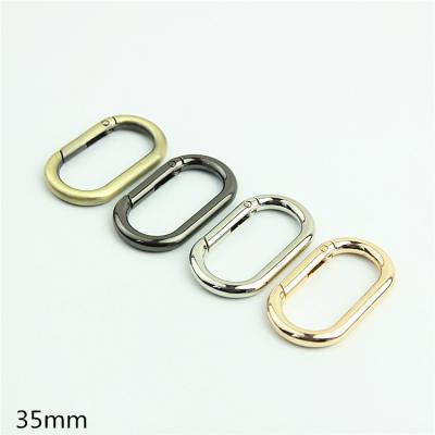 China Metal Luggage Hardware Bag Accessories Open Oval Egg Shaped Spring Ring Buckle Connecting Bag With Lifting Ring35mm for sale