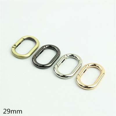 China Metal Luggage Hardware Bag Accessories Open Oval Egg Shaped Spring Ring Buckle Connecting Bag With Lifting Ring29mm for sale