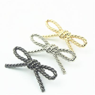 China Metal Twist Rope Bow Shoe Buckle Shoe Flower Shoe Garment Accessories Jewelry Decoration Metal Luggage Hardware Accessories for sale