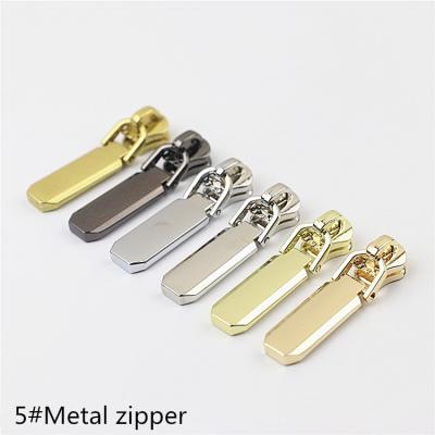 China Other Wholesale Hardware Accessories Nickel Plated 5# Metal Tooth Handle Pendant Zipper Puller for sale