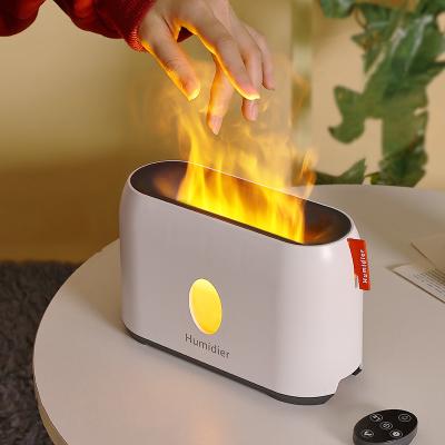 China Flame Light 2022 New Portable Remote Control Diffuser Trending 3D Essential Oil Aroma Flame Desktop Mini Air Humidifier with LED Night Light for sale