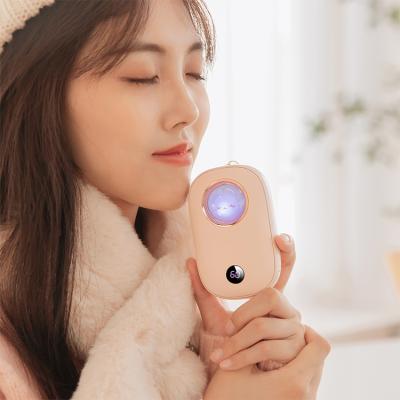 China USB Rechargeable Hand Warmer Mini Portable Pocket Power Bank Colorful Electric Hand Warmer Customized Hand Warmer for sale