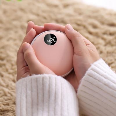 China Hot Sale Mini Electric Charging Hand Warmer Power Bank Rechargeable Hand Warmer USB Pocket Warmer Winter Gift for sale