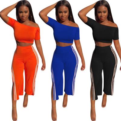 China Breathable Wholesale Ladies Fashion Solid Color Shorts Sleeve Off Shoulder Crop Stripe Pants Top Women 2021 Clothing 2 Piece Set for sale