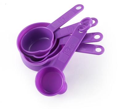 China Sustainable Heart Shaped Measuring Cups Cooking Uses Plastic Cooking Measuring Cup for sale