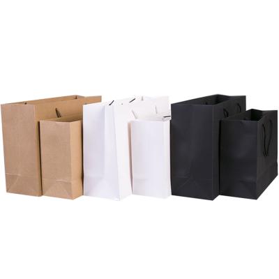 China Recyclable Customized Large Kraft Paper Bag With PP Handle for sale