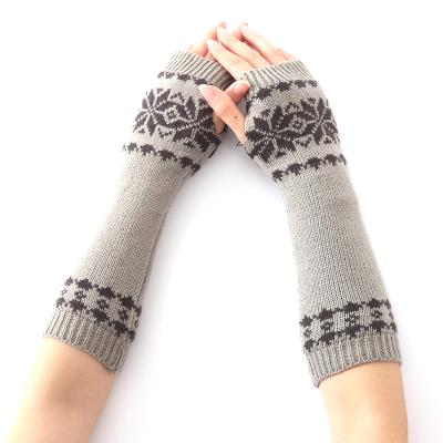 China Simple Winter Snowflake Pattern Arm Long Warm Knitted Fingerless Gloves For Women High Elastic Winter Warm for sale