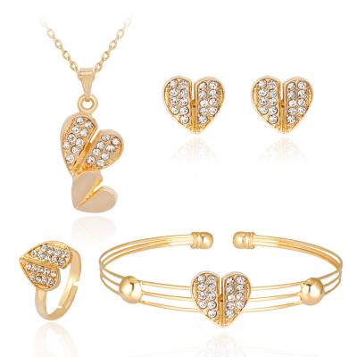 China Fashion 4pcs Ethnic Gold Plated Alloy Diamond Heart Necklace And Earrings Pakistan Jewelry Set for sale