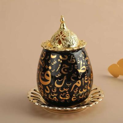 China 2020 hot sale new design resin censer cup shape arabic creative censer with handle for sale