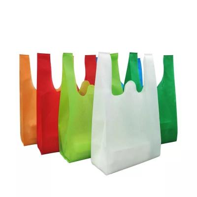 China Recyclable Custom Logo Eco Friendly Reusable Die Cut Grocery Shopping T-shirt Bag Non Woven Bag for sale