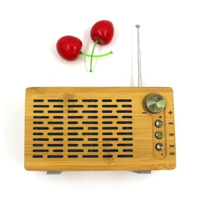 China Blue Radio Mini Double Horn Bamboo Wireless Tooth Phone TF Card U Disk Stereo Mini Subwoofer Speaker for sale