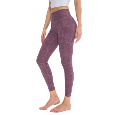 China Breathable Seamless High Waist Hip Lift Sports Pants Quick-Drying Elastic Fitness Leggings Printed Yoga Women's Pants With Pockets for sale