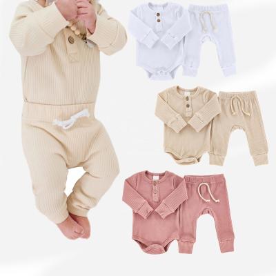 China Anti-Shrink Factory Customized 2022 New Design 2pcs Newborn Baby Clothing Sets Organic Cotton Ribbed Solid Cute Kids Romper Set for sale