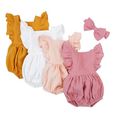 China Muslin cotton 2022 summer new fashion style muslin cotton baby clothes with headband flutter sleeve toddler solid rompers girls for sale