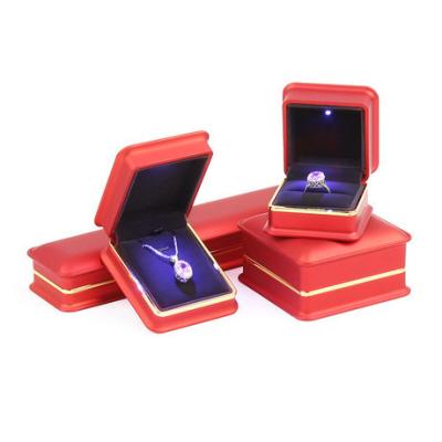 China Handmade Custom Jewelry Box With UV Coating Plastic Handmade Led Light Jewelry Packaging for sale