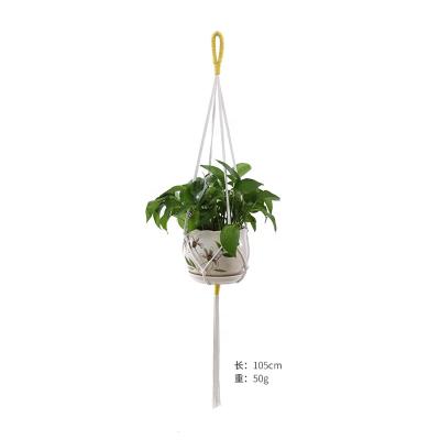 China Eco-Friendly Most Popular Macrame Shelf Cotton Craft Hanging Decor Handmade Plant Hangers For Garden Decor for sale