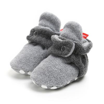 China 2021 New Cute Winter Casual Hot Baby Keep Warm Can't Drop Foot Plush Thickening Cotton Shoes Massage Insoles for sale