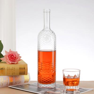 China Creative Whiskey Relief Bottle 750ml Crystal Glass Fruit Bottle for sale