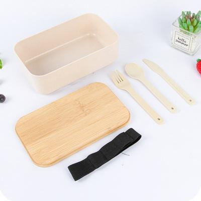 China Cute Insulated Wheat Straw Bento Lunch Box Portable Black White Colorful Hot Food Freshness Storage Square With Bamboo Lid And Cutlery for sale