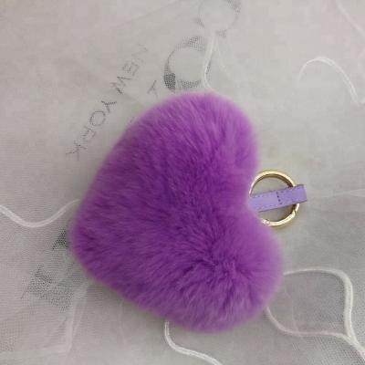 China Personalized Soft/Eco-Friendly/Fluffy/Handmade Half Human Heart Shaped Pom Pom Keychain for sale