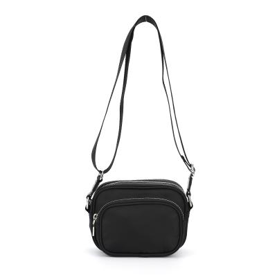 China Nylon Classic Women Shoulder Pocket Sling Casual Bag Black Cross - Body Bag Messenger Bag for sale