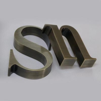 China Customized Bronze Coppery Outdoor Indoor Stainless Steel Slide Logo Metal Letters for sale