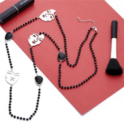 China Wholesale Lady Human Face Black Silver Crystal Sweater Necklaces Long Chain ALLOY Statement Beads Necklace for sale