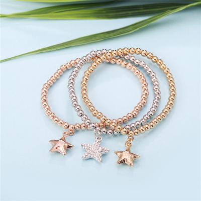 China Fashion Personalized Friend Gift Round Beads Elastic Chain Women Crystal Shiny Star Pendant Bracelets Cute Star Pentagon Bracelet for sale