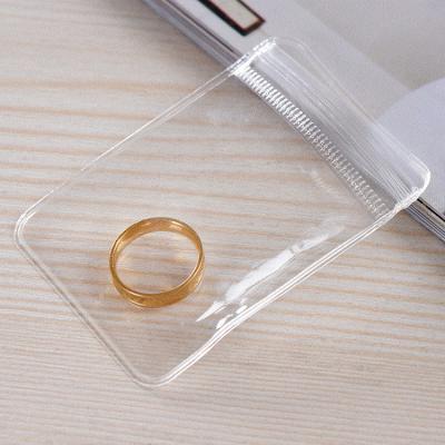 China Transparent Clear Logo Jewelry Bag Mini Small Jewelry Decoration PVC Ring Earring Bracelet Jewelry Packaging Bag Wholesale Custom Plastic Pouch for sale