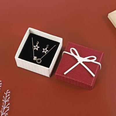 China The current wholesale colorful butterfly knot small box package earring and necklace jewelry decoration set jewelry boxes for sale