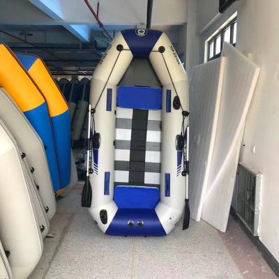 China PVC 3 Person Inflatable Kayak 2.3 M PVC Rowing Boats With Freestanding Raft Dinghy Canoe Accessories Wooden Floor for sale