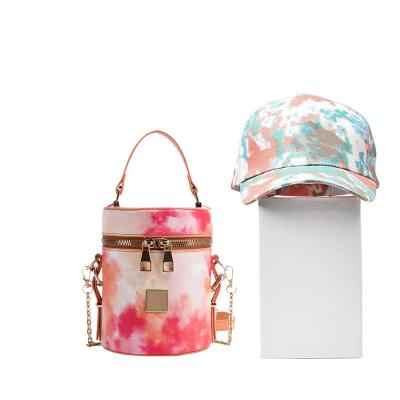 China 2021 newest high quality trend ladies handbags fashion design link dye bucket bag handbags and hat luxury set for sale