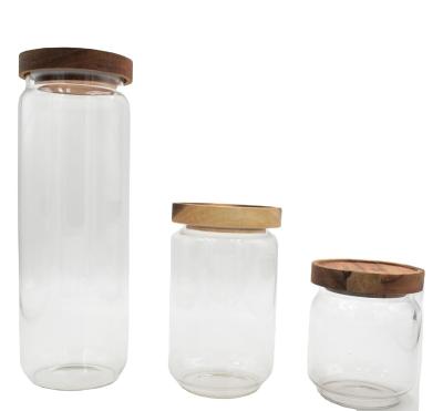 China Freshness Preservation Food Storage Borosilicate Custom Top Decorate Fancy Glass Jars With Bamboo Lid for sale