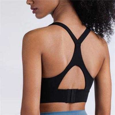 China 2022 Women's Medium Support Yoga Bra Wireless Tops Breathable Strappy Sexy Back Aplet YOGA Bra Wireless Top for sale