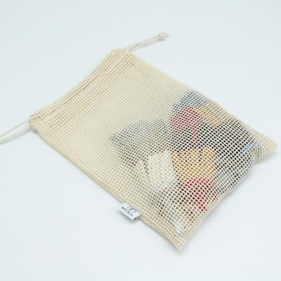 China Food Packaging Mesh Fabrics Raw Material Drawstring Bag Fruit Pouch With Custom Label for sale