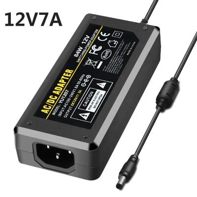 China Universal PC CCTV LED Power Supply 12V 7A Laptop DC to AC Adapter Flame Retardant Material Power Adapter for sale