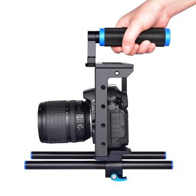 China Portable Flexible Professional DSLR Camera Cage Video Rig Cage Kit With Top Hand Grip for sale