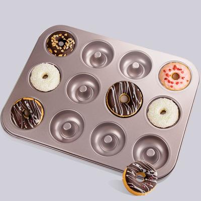 China Home Viable Carbon Steel Gold 12 Cavity Non-Stick Donut Mold For Cupcake Cake Mold Cookie Making Tray Mold Donts Stanlis Bake for sale