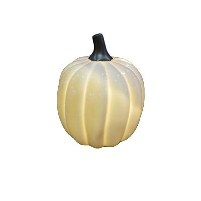 China Africa Handmade White Ceramic Pumpkin LED Lantern Festival Decoration Cheap Ceramic Halloween Pumpkin Decoration for sale