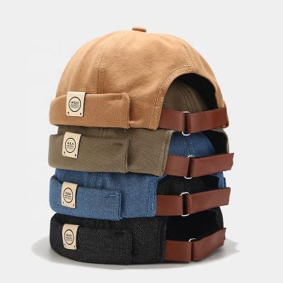 China Custom Cotton Woven Adjustable Brimless Baseball Caps Baseball Caps Hat Denim Brimless Label Docker Hats for sale