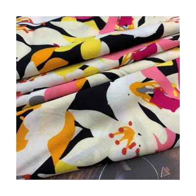 China Soft And Comfortable Rayon Flower Metallic Print Fabric Opaque And Non-Fading High Density High Grade Fabric for sale