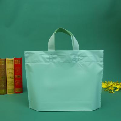 China Eco - Friendly Waterproof Solid Color Customized Durable Plastic Shopping Bags With Soft Loop Handle for sale