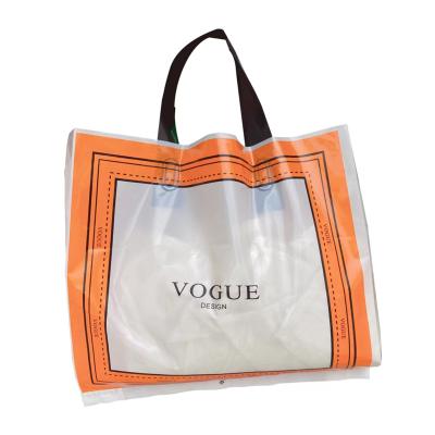 China OEM Eco-Friendly Waterproof Factory Shopping Reusable Plastic Tote Bag With Handle For Apparel Gift Shop for sale