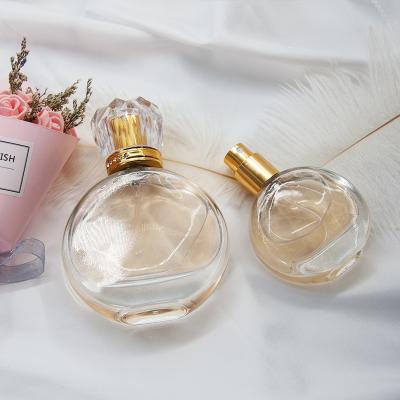 China Personal Care Factory Empty 25ml 50ml Transparent Refillable Glass Spray Round Perfume Bottle for sale